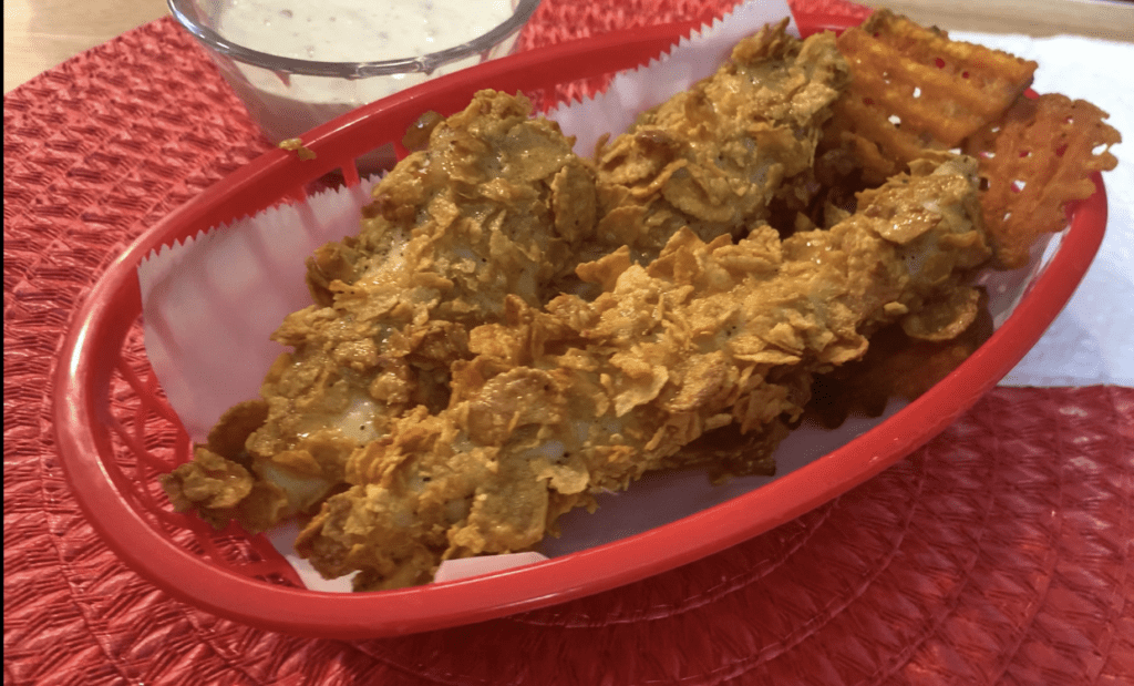 Corn Flake Chicken Tenders in red basket