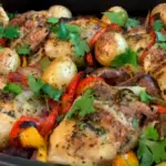 Roasted chicken thighs, sausage, peppers and potatoes