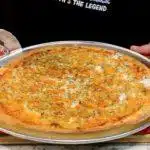 Slicing Buffalo Chicken Pizza