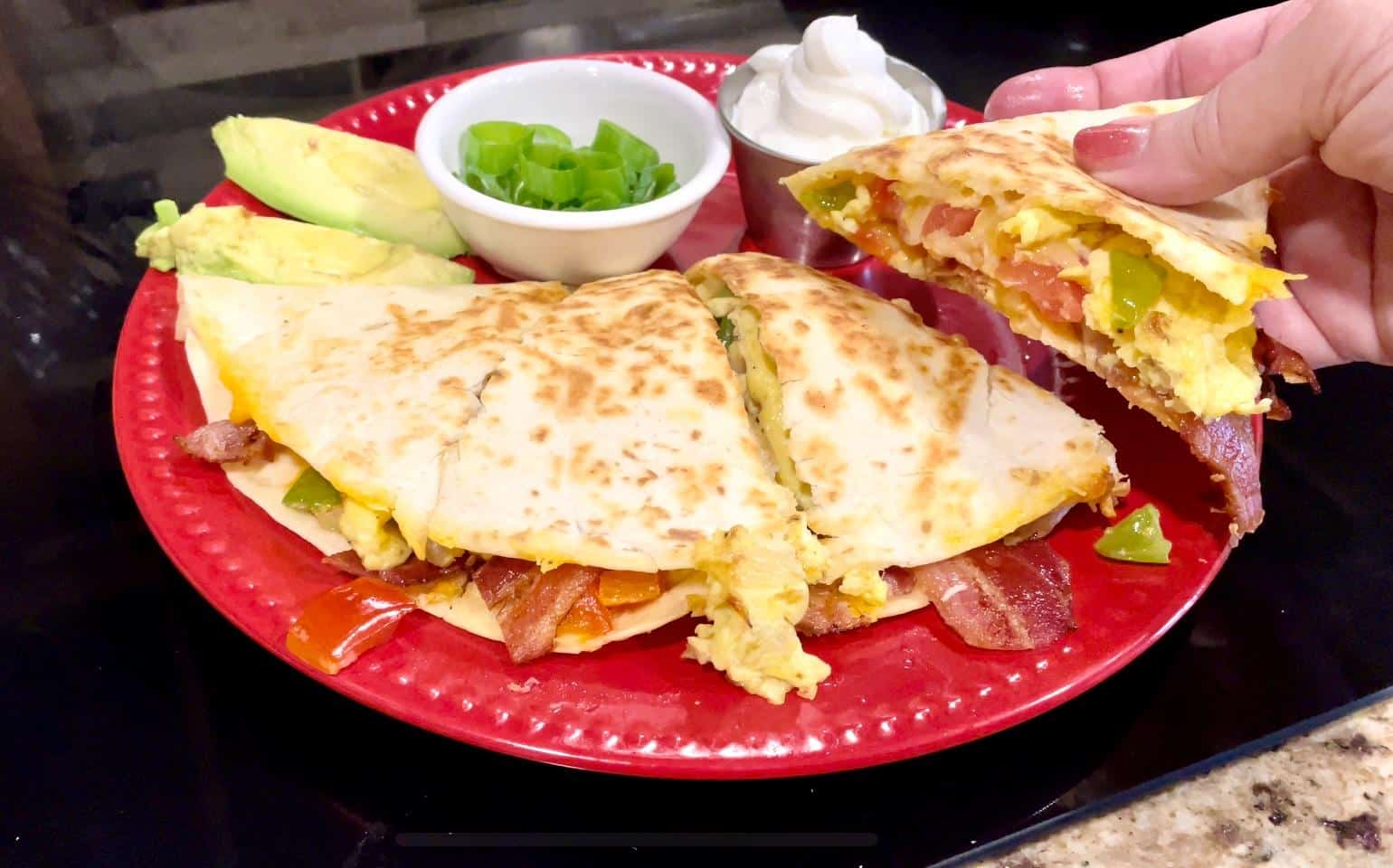 Breakfast Quesadilla on a red place