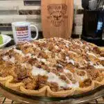 Homemade Apple Crumble Pie on rack