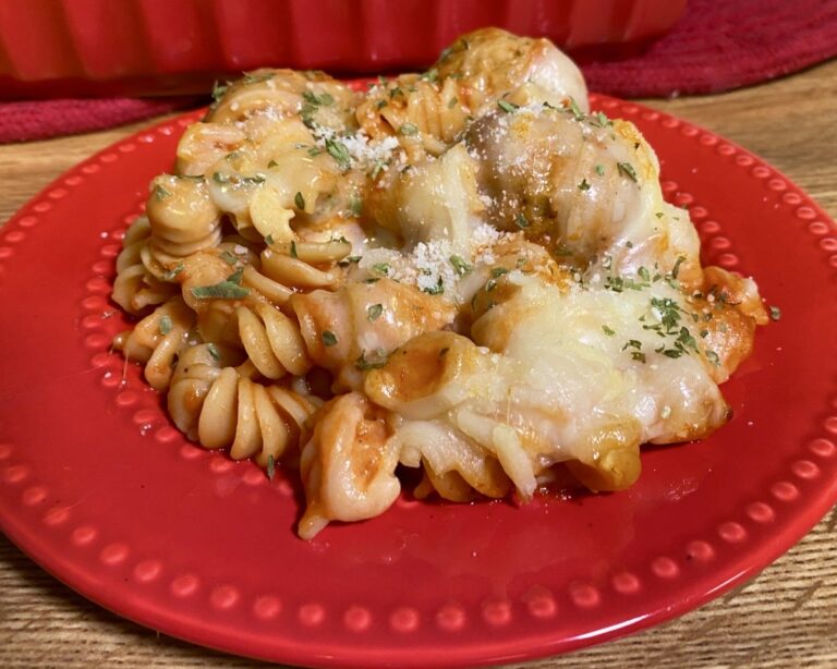 Easy Dump and Bake Meatball Casserole on a red plate