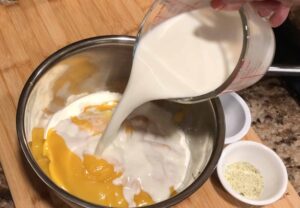 Making cheese sauce in a bowl