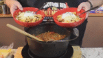 Cast Iron Pot with two bowls of Texas Chili
